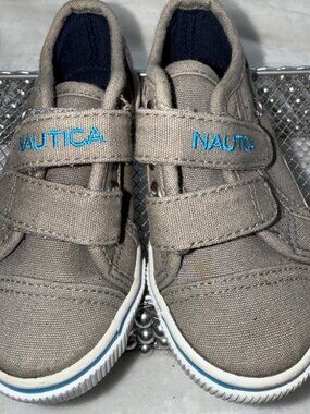 Nautica Kids Shoes Used size 6. Grey and light blue lettering.